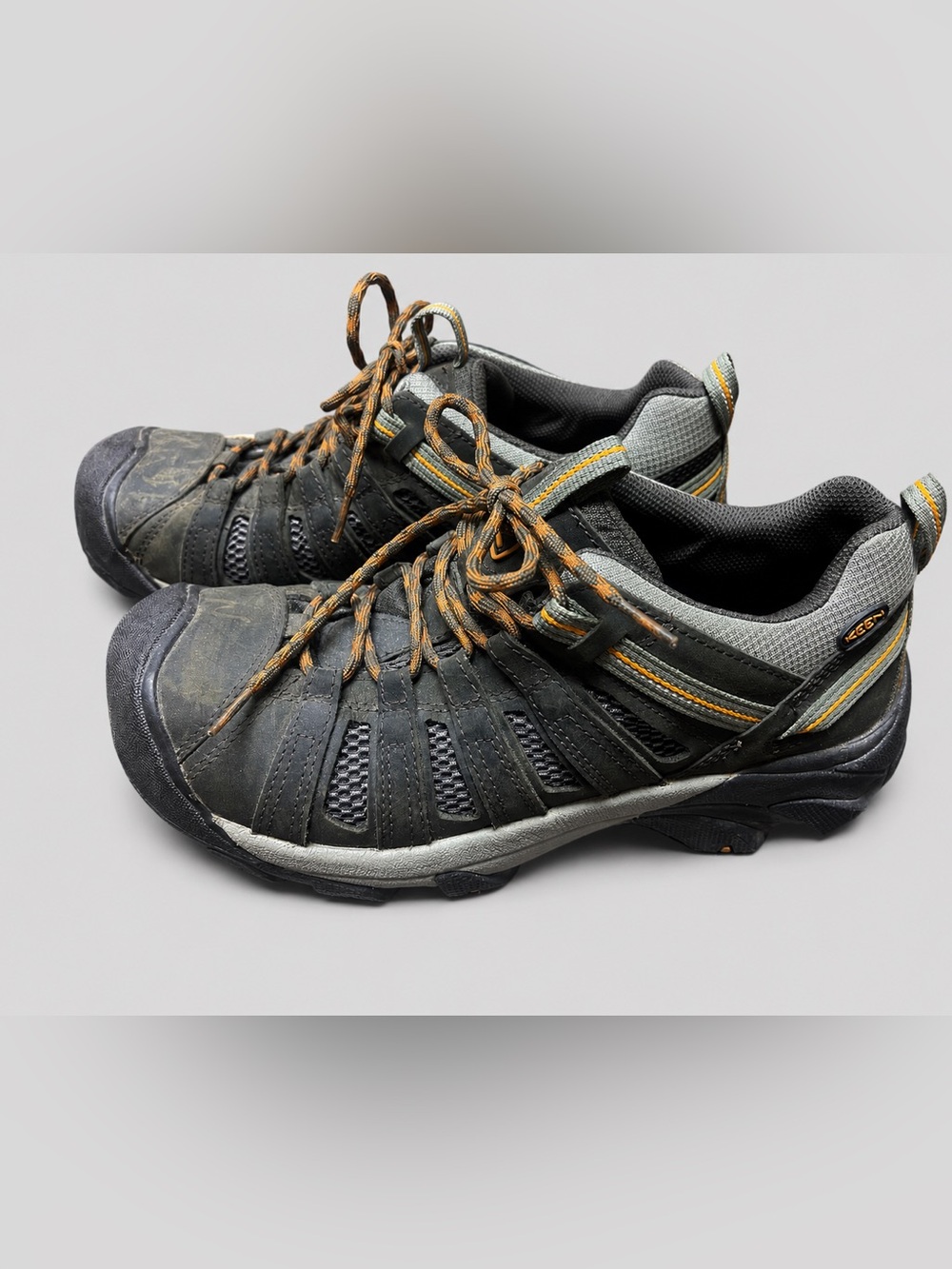 Keen Men's Black and Gray Athletic Trail Shoes with Orange Accents